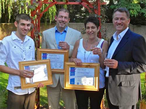 Matthew Lewis, Doug Field and Clare Barrell, all with S A Brain & Co. in Wales, receive their Awards from Retail Director Philip Lay